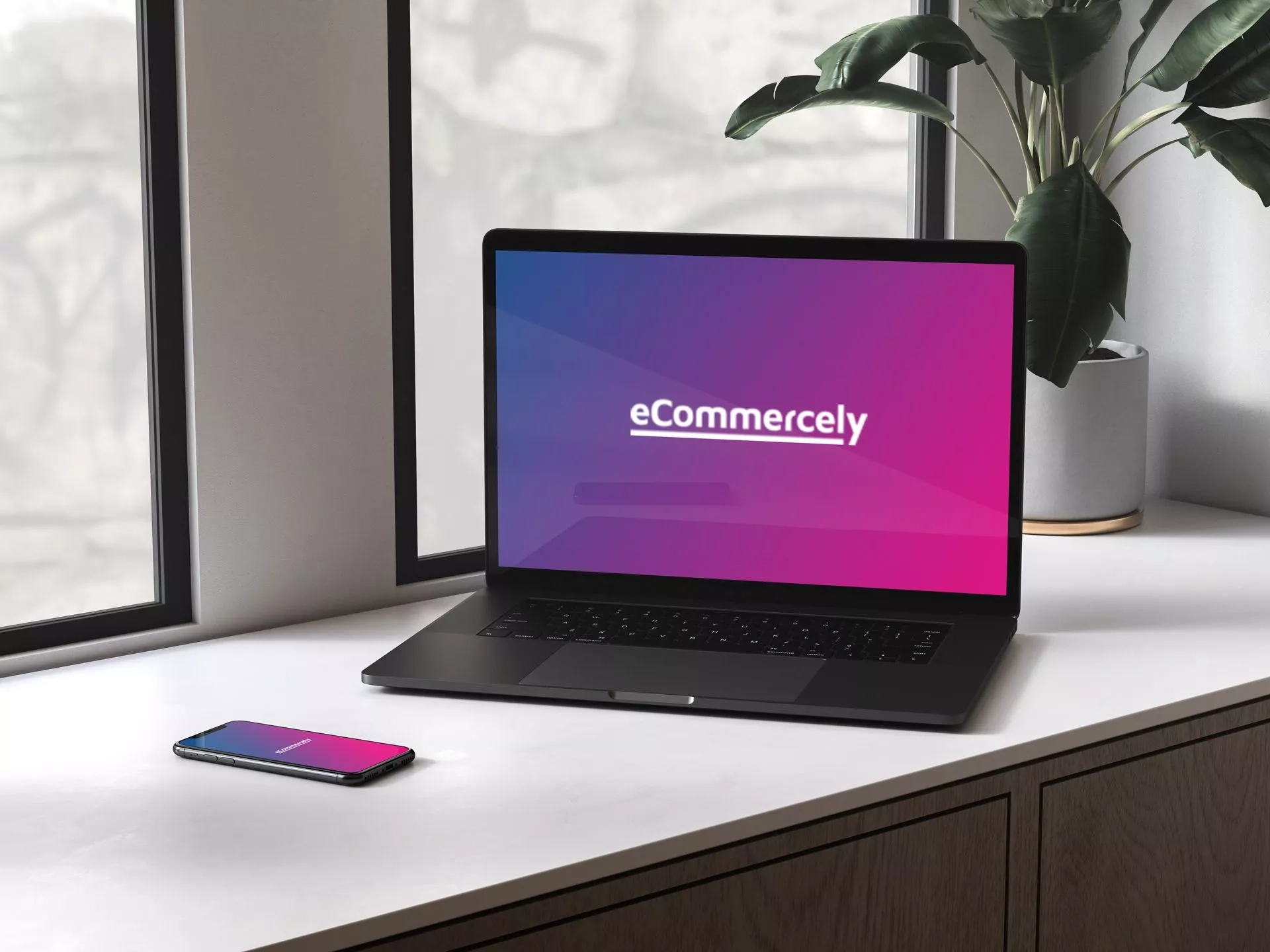 Laptop und Smartphone mit eCommercely Logo